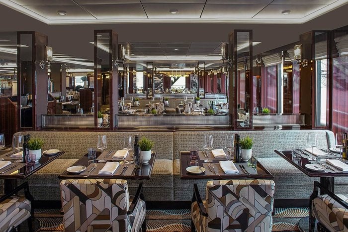 Porto, the main restaurant aboard Atlas Ocean Voyages World Navigator