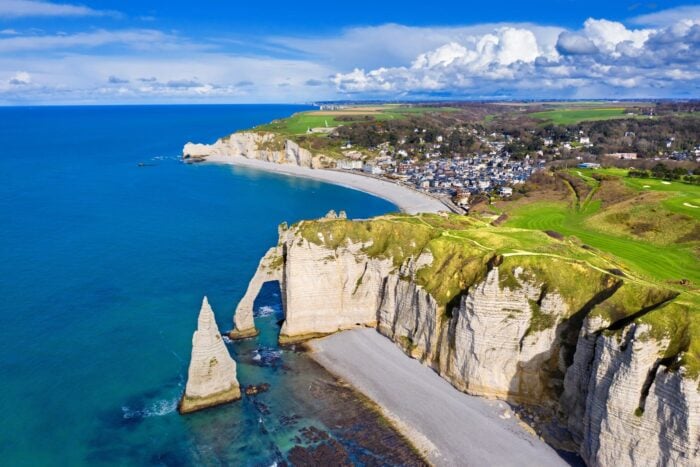 Aerial view of the white cliffs and town of Etretat on the Normandy coast
