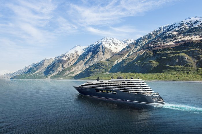 Ritz-Carlton Yacht Collection military discount cruise past snow-capped mountains in Alaska